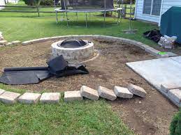 Laying The Rumble Stone Border For Fire Pit Fire Pit Fire Pit Backyard Stone Fire Pit