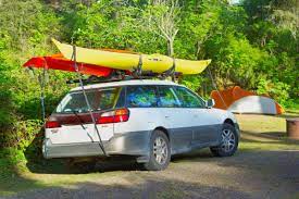 Most kayak racks would simply fold down at the bars when kayak transportation is not required. How To Strap Two Kayaks To A Roof Rack It S Easier Than It Seems