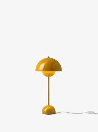 Available in your choice of retro tones, our hylight lamp is crafted of iron with an angled arm and details in an antique brass finish. Tradition Flowerpot Vp3 Table Lamp Mustard Finnish Design Shop