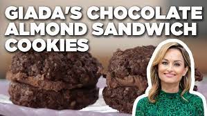 Almond flour, almond extract, and slivered almonds ensure that you get an intense flavor that will eclipse any paper filled almond cookies symbolize coins and will be sure to bring you good fortune. Giada De Laurentiis Chocolate Almond Sandwich Cookies Giada Entertains Food Network Youtube