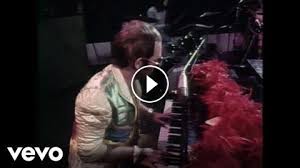 Elton John Step Into Christmas Official Singalong Video