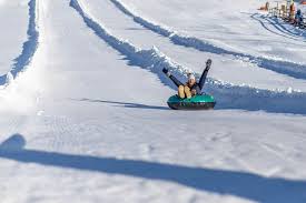 Snow tubing is simply a fun, recreational activity that makes use of gravity to transport oneself to the bottom of a slope while riding an inner tube. Snow Tubing Hunter Mountain Resort