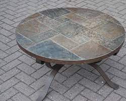 Slate coffee tables come in all shapes and styles, including the distinctive look of a stone and metal coffee table. Midcentury Wrought Iron And Slate Round Shape Coffee Table Or Cocktail Table For Sale At 1stdibs