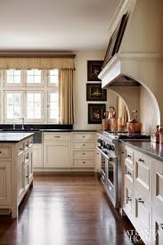 The only reason i repainted when painting glass doors, you can mask off the glass with painters tape, but i find just painting and then removing the paint that got on the glass. What To Do When You Secretly Love Cream Kitchen Cabinets Heather Hungeling Design