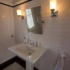 While these walls weren't originally chair rail alone, you can see how the horizontal moulding would act as the beginning point for a gorgeous wall installation that can be as simple or as detailed as your budget/skills allow! Black Marble Chair Rail Design Ideas