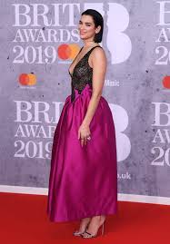 British album of the year for future nostalgia and female solo artist. Dua Lipa Stuns At The 2021 Brit Awards In Retro Mini Dress Black Stockings See Pic Newsbinding