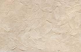 In other words, a willing beginner can for the finish coat, use durabond or veneer plaster: Exterior Wall Covering Patching Stucco On The House