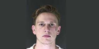 Former airman sentenced to 18 years in prison for role in 2018 drug heist  slaying