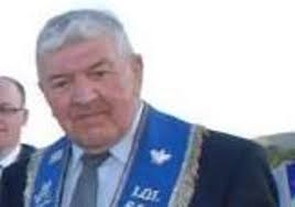 Former RUC man from Larne was passionate road racing fan