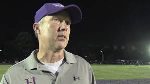 Male football coach Chris Wolfe talks after win over Ballard