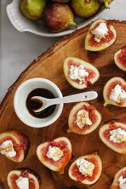 Nyt Cooking Here S A Super Simple Appetizer Fresh Figs Are Halved And Stuffed With Any Cre Goat Cheese Recipes Thanksgiving Appetizer Recipes Appetizers Easy