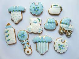 Baby Boy Cookies No Source Blue White Bottle Rattle Onsie Bib Carriage Bear Bootie Baby Cookies Baby Boy Cookies Baby Shower Sweets