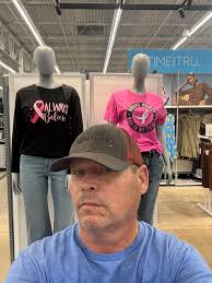 I'm taking a selfie. I'm in Shelby at the Walmart. Hello everybody. Hope  you're doing well. See my people behind me. It's getting cold outside. I'm  being silly. You all. Please be