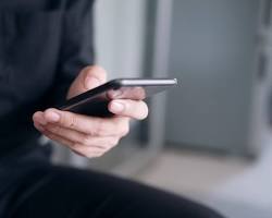 صورة person using mobile phone for education