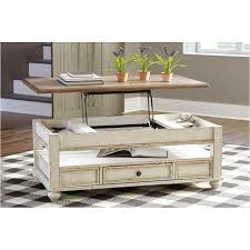 Made of metal and engineered wood. Ashley Furniture Coffee Table Wild Country Fine Arts