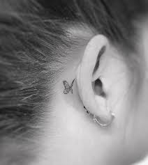 Behind the ear tattoos come in different designs like the butterfly design, tribal, elephant, cat, star, flowers and even the numerical letters like the one below. Tattoo Trends 19 Trending Butterfly Tattoo Behind Ear Black Girl Clubtattoo Gallery Daily Tattoo Ideas Designs Inspirations