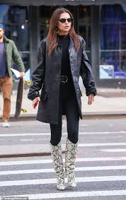 These boots are basically slippers disguised as a pair of shoes. Emily Ratajkowski Sports All Black Ensemble With Knee High Snakeskin Boots In New York City Daily Mail Online
