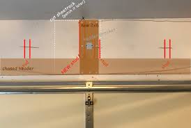 Use 2x4 with a double jack under each end of the header. Installing 2x4 Header For Garage Door Opener Home Improvement Forum