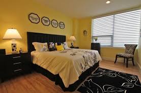 With 65 beautiful bedroom designs, there's a room here for everyone. 20 Sophisticated Black And Yellow Bedrooms Home Design Lover Yellow Bedroom Walls Bedroom Furniture Design Yellow Bedroom