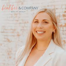 Taryn Pierson- Realtor added a...