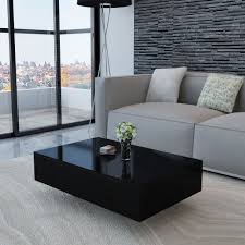 I am trying to determine the ideal size for a new coffee table that will sit between two sofas that face each other. Table Basse Vidaxl Table Basse Rectangulaire En Mdf Noir Brillant Basse Brillan Coffee Table High Gloss Modern Furniture Living Room Living Room Side Table