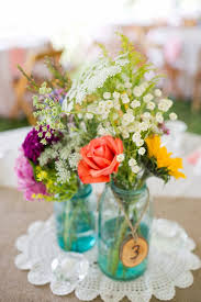 I love how perfectly imperfect this diy looks! Something Blue 45 Rustic Blue Mason Jars Wedding Ideas Deer Pearl Flowers