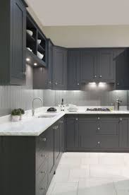 We went for dark wood kitchen designs, and the offer is diversified, so you can pick some of these according to what you wish for for your new kitchen, either built from scratch or that overdue kitchen remodel you have. 40 Fashionable Dark Grey Kitchen Design Ideas Kitchendesign Kitchenideas Kitchenremodel Grey Kitchen Designs Modern Kitchen Design Kitchen Cabinet Design