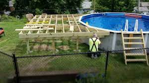 The building procedure involves setting the frame and then adding the decking, guard rails, and stairs leading from the ground to the deck. Pin On Pool Ideas