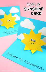 Secure the second piece of paper to the card with the pop up. You Are My Sunshine Card Easy Pop Up Sun Card Template I Heart Crafty Things