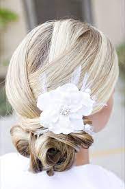 White And Gold Wedding Bridesmaid Hair Natural Hair White Flower Crisscross Updo Chignon Wedding Summer Wedding Hairstyles Wedding Hair Inspiration