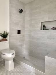Bathroom renovated with mosaic of grey tiles. 43 Impressive Bathroom Shower Remodel Ideas Ideas For House Renovations Master Bathroom Shower Small Bathroom Bathrooms Remodel