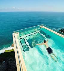 15 Bali Resorts With Unique Infinity Pools And Gorgeous Views Infinity Pool Bali Infinity Pool Resort Bali Indonesia