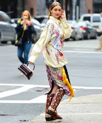 If you're looking for something extra, go for a pair of boots with elegantly stitched designs along the shafts. How To Wear The Cowboy Boots Trend Instyle