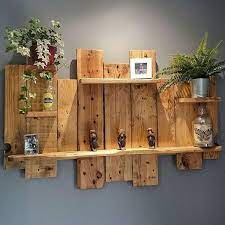 11 Creative And Easy Diy Pallet Wall Art Ideas To Try Godiygo Com Pallet Wall Shelves Pallet Wall Art Pallet Wall Decor