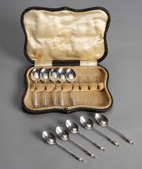 A CASED SET OF FIVE EDWARD VII SILVER FIGURAL MOCHA SPOONS, ADOLPH SCOTT,  SHEFFIELD, 1908