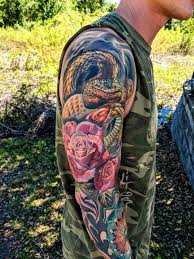 Scary snake tattoose on the leg. 30 Best Snake Tattoo Designs Of 2021