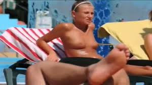 Topless skinny girl looks sexy at the water park | voyeurstyle.com