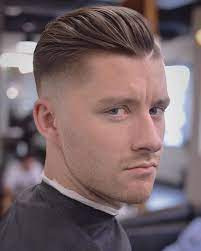 Blackfishbry Loose Textured Skin Fade Pompadour With A Shaved In Part Haircuts For Men Classic Mens Haircut Skin Fade Pompadour