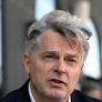 Fabien Roussel Calls for a Communist Revolution to Address France's Economic and Environmental Challenges Amid Macron's Mixed Record
