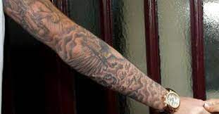 David beckham's tattoos, angels, winged crosses british soccer player david beckham has been collecting tattoos for many years. David Beckham S Right Arm Sleeve Tattoo