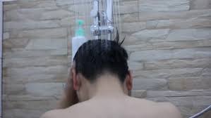 Young Man Washing Hair Under Shower Man Take A Shower In The Apartment Bathroom Video Take A Shower Stock Video