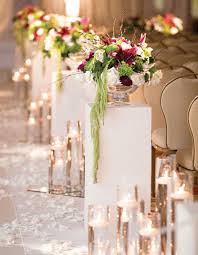 Modern Candle Inspiration With Floral Arrangements Geometric Wh With Images Wedding Aisle Decorations Wedding Ceremony Flower Arrangements Wedding Ceremony Decorations