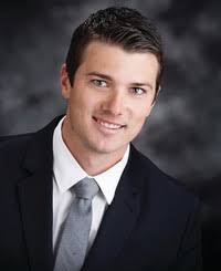 Ray W Johns, Insurance Broker