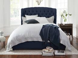 Enhance your bedroom aesthetic with the sleek and sophisticated. Bed Tufted