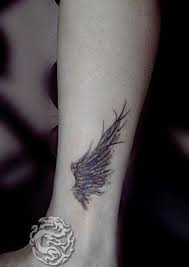 Free Tattoo Designs Angel Wing Tattoo On The Ankle Wing Tattoo Feather Tattoos Free Tattoo Designs