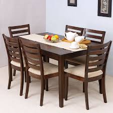 So what can be done to facilitate a full sized eating area when the desire is bigger than the place it's meant for? Elmwood Texas Dining Table With Six Chairs Fabfurnish Com Dinning Table Design Dining Table Design Wooden Dining Room Table