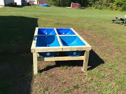 Raised Garden Made From Plastic Blue Barrels And Easy On Your Back Building A Raised Garden Vegetable Garden Raised Beds Raised Garden