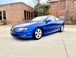 Image result for Arrival Blue 2004 Pontiac