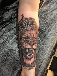 Roaring lion with crown tattoo on arm sleeve. Lion Crown Tattoo Crown Tattoo Tattoos Lion Tattoo Sleeves