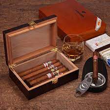 This great gift set showcases a beautiful humidor, with a tobacco leaf emblem on the lid, that holds 25 to 40 cigars. Woodronic Handmade Cigar Humidor Spanish Cedar Lining For 10 To 20 Counts Desktop Cigar Box Gift Set With Clasp Lock Bourbon Of The Day